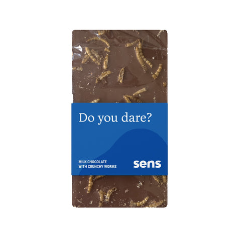 Bar of Sens milk chocolate with whole crunchy edible mealworms set into it